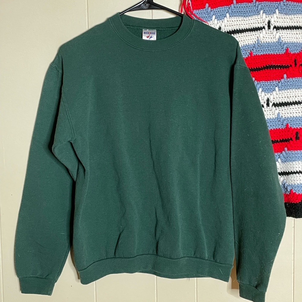Small dark green sweatshirt